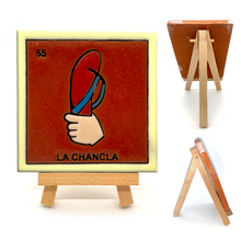 Load image into Gallery viewer, Handmade Clay Square Tile and Stand - Loteria No 55 La Chancla 4&quot; x 4&quot;