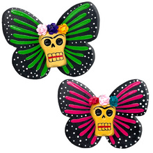 Load image into Gallery viewer, Mexican handmade folkart butterfly mariposa featuring calavera Frida with flower crown. crafted of barro and wood, meticulously handpainted and unique. Comes in 2-pack set.