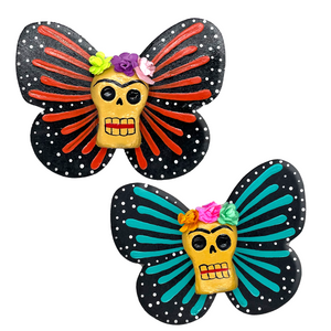 Mexican handmade folkart butterfly mariposa featuring calavera Frida with flower crown. crafted of barro and wood, meticulously handpainted and unique. Comes in 2-pack set.