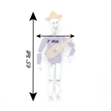 Load image into Gallery viewer, Mexican handmade traditional folk-art calaca skeleton musician with instrument. Can be hung or bends to display 